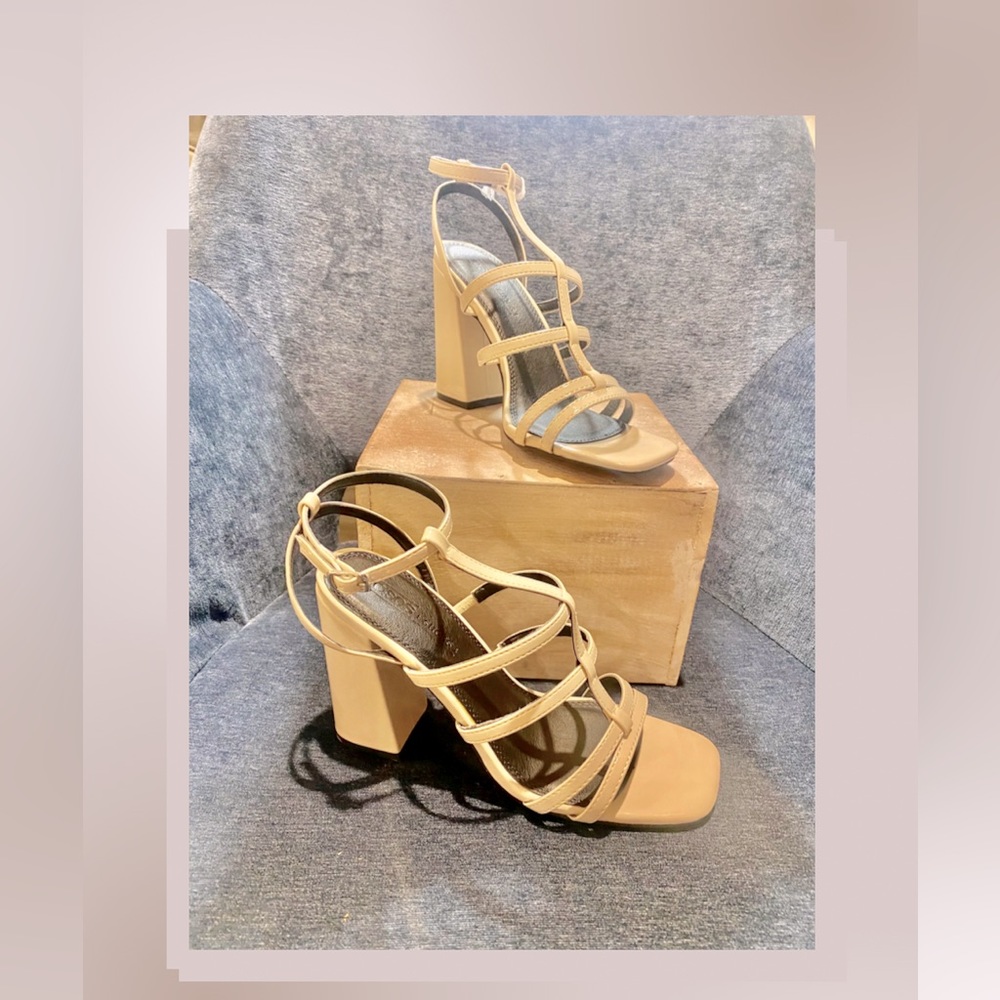ASOS Strappy sandal with block heel in bone color.